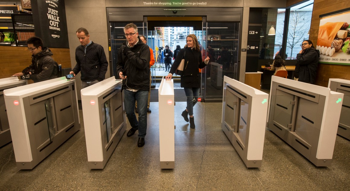 Shoppers scan the Amazon Go app on the mobile devices as the enter the Amazon Go store, on January 22nd, 2018, in Seattle, Washington.