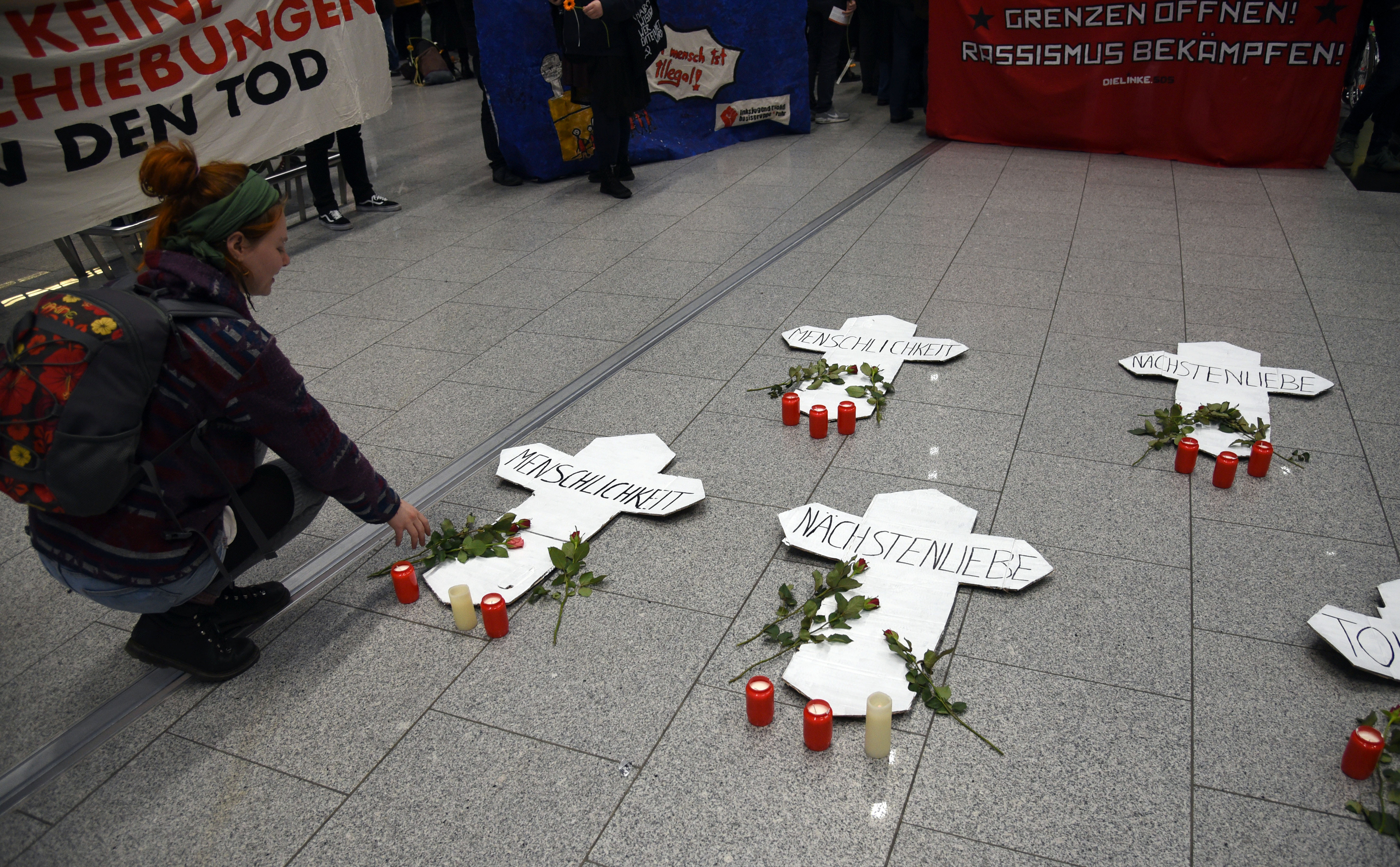 People protest against the deportation flight of refugees to Afghanistan at the airport in Düsseldorf, Germany, on January 23rd, 2018.