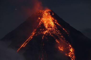 Lava flows from Mount Mayon on January 25th, 2018, as seen from south of Manila, the Philippines. Philippine authorities declared a no-go zone around the volcano after tens of thousands of residents fled to safety.