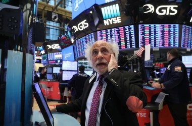 Traders work on the floor of the New York Stock Exchange moments before the closing bell on February 8th, 2018, in New York City.