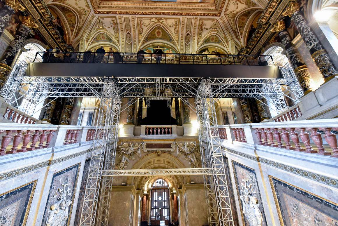 Visitors stand on a suspended bridge, 12 meters above the ground, to take a closer look at paintings by Austrian painter Gustav Klimt during the "Stairway to Klimt" exhibition at the Kunsthistorisches Museum in Vienna. The exhibition, marking the centenary of the death of Gustav Klimt (1862-1918), allows visitors to access 13 paintings commissioned by Emperor Franz Joseph.