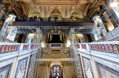 Visitors stand on a suspended bridge, 12 meters above the ground, to take a closer look at paintings by Austrian painter Gustav Klimt during the "Stairway to Klimt" exhibition at the Kunsthistorisches Museum in Vienna. The exhibition, marking the centenary of the death of Gustav Klimt (1862-1918), allows visitors to access 13 paintings commissioned by Emperor Franz Joseph.