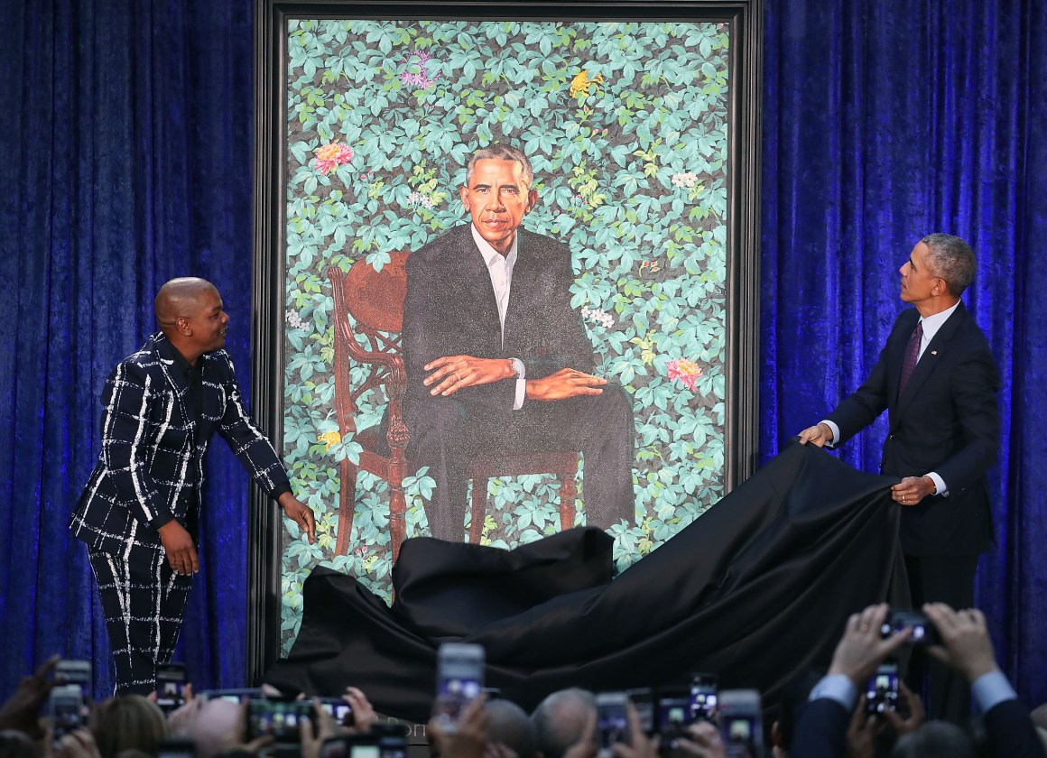 Former U.S. President Barack Obama and artist Kehinde Wiley unveil Obama's portrait during a ceremony at the Smithsonian's National Portrait Gallery on February 12th, 2018, in Washington, D.C.