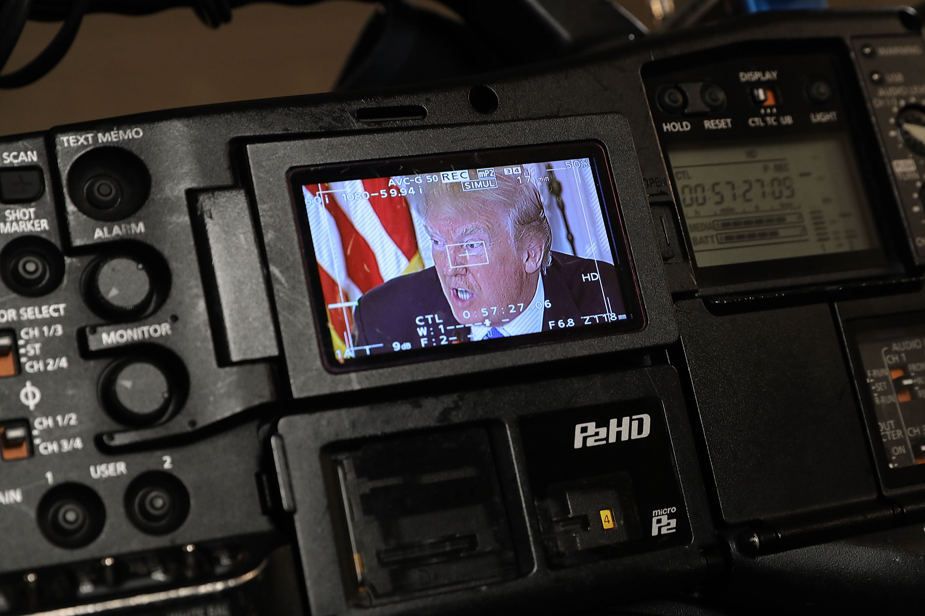 President Donald Trump appears on a television camera monitor during a meeting with state and local officials to unveil his administration's long-awaited infrastructure plan in the State Dining Room at the White House on February 12th, 2018, in Washington, D.C.