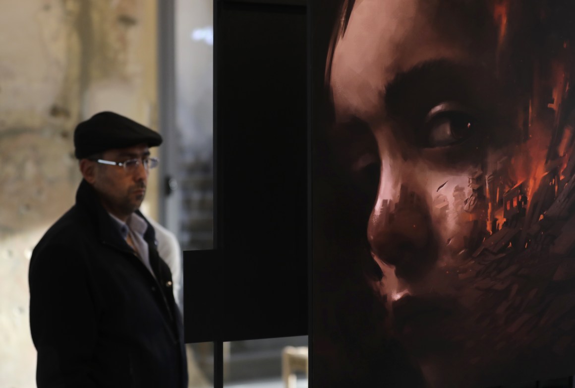 People visit the exhibition "Haneen, a Collective Work of Lebanese and Syrian Artists on the Impact of War on Childhood," in Beirut, the capital city of Lebanon, on February 20th, 2018. The United Nations Children's Fund (UNICEF) launched the exhibition, which underlines how children experience war through works inspired by poetry by Syrian refugee children.