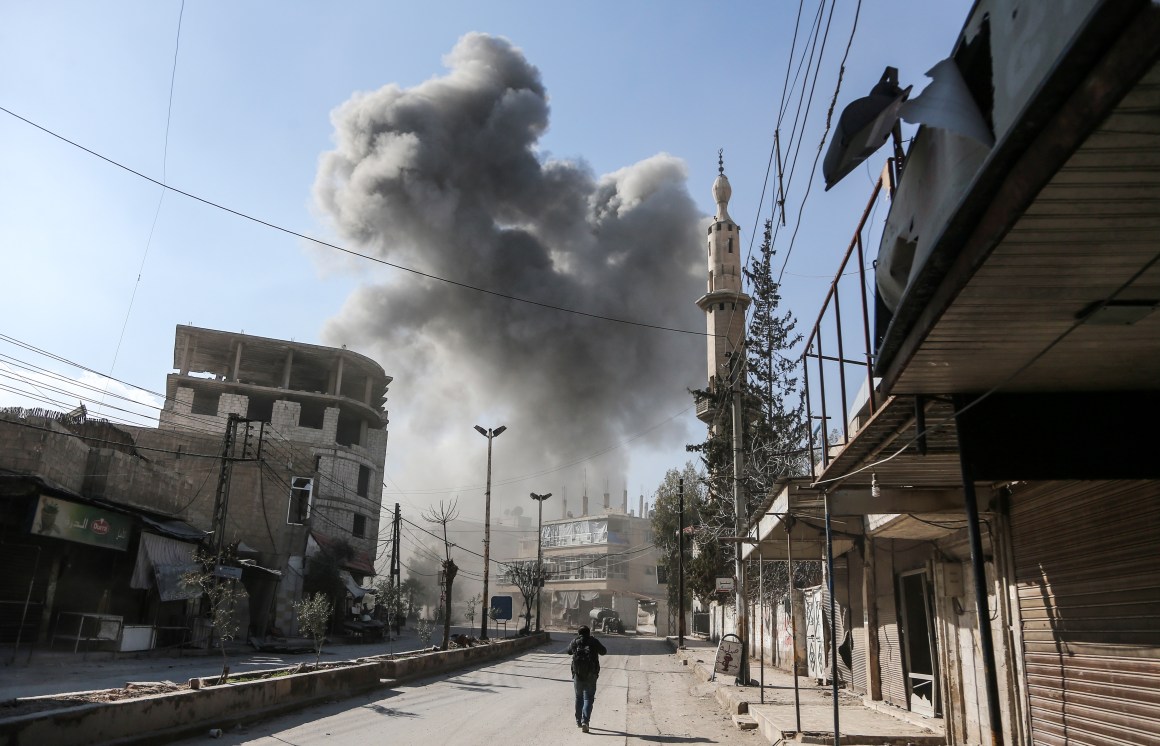 A picture taken on February 21st, 2018, shows a smoke plume rising following a reported regime air strike in the rebel-held enclave of Hamouria in the Eastern Ghouta near Damascus in Syria.