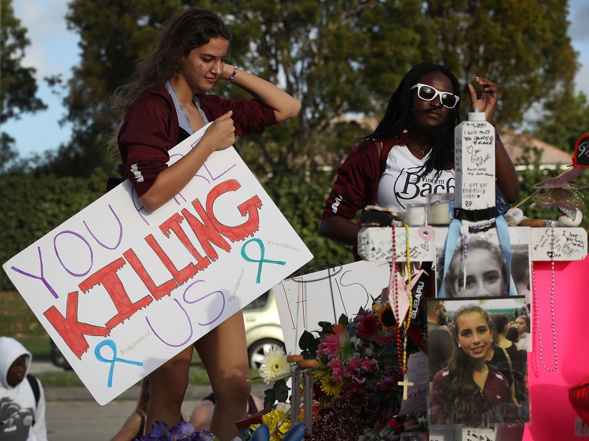 Haleigh Grose, a ninth grader at Marjory Stoneman Douglas High School, at a memorial in front of the school where 17 people were killed in Parkland, Florida.