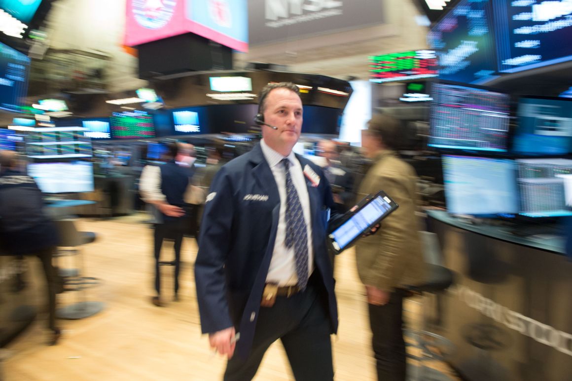 Traders work on the floor at the closing bell of the Dow Industrial Average at the New York Stock Exchange on February 22nd, 2018, in New York.