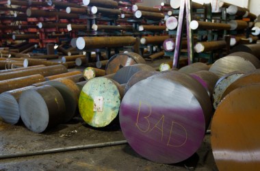 The word bad is written on the end of a machine grade bar of steel at the Pacific Machinery & Tool Steel Company on March 6th, 2018 in Portland, Oregon.