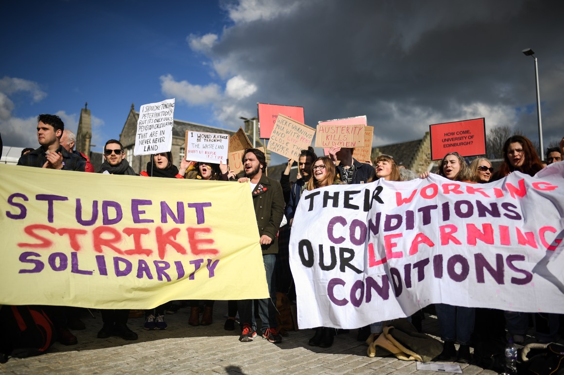 University workers attend a rally outside the Scottish Parliament on March 8th, 2018, in Edinburgh, Scotland. Politicians, students, and union officials joined Scottish university staff as they demonstrated over pensions changes.