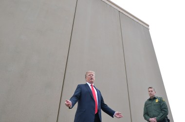 President Donald Trump inspects border wall prototypes with Chief Patrol Agent Rodney S. Scott in San Diego, California, on March 13th, 2018.