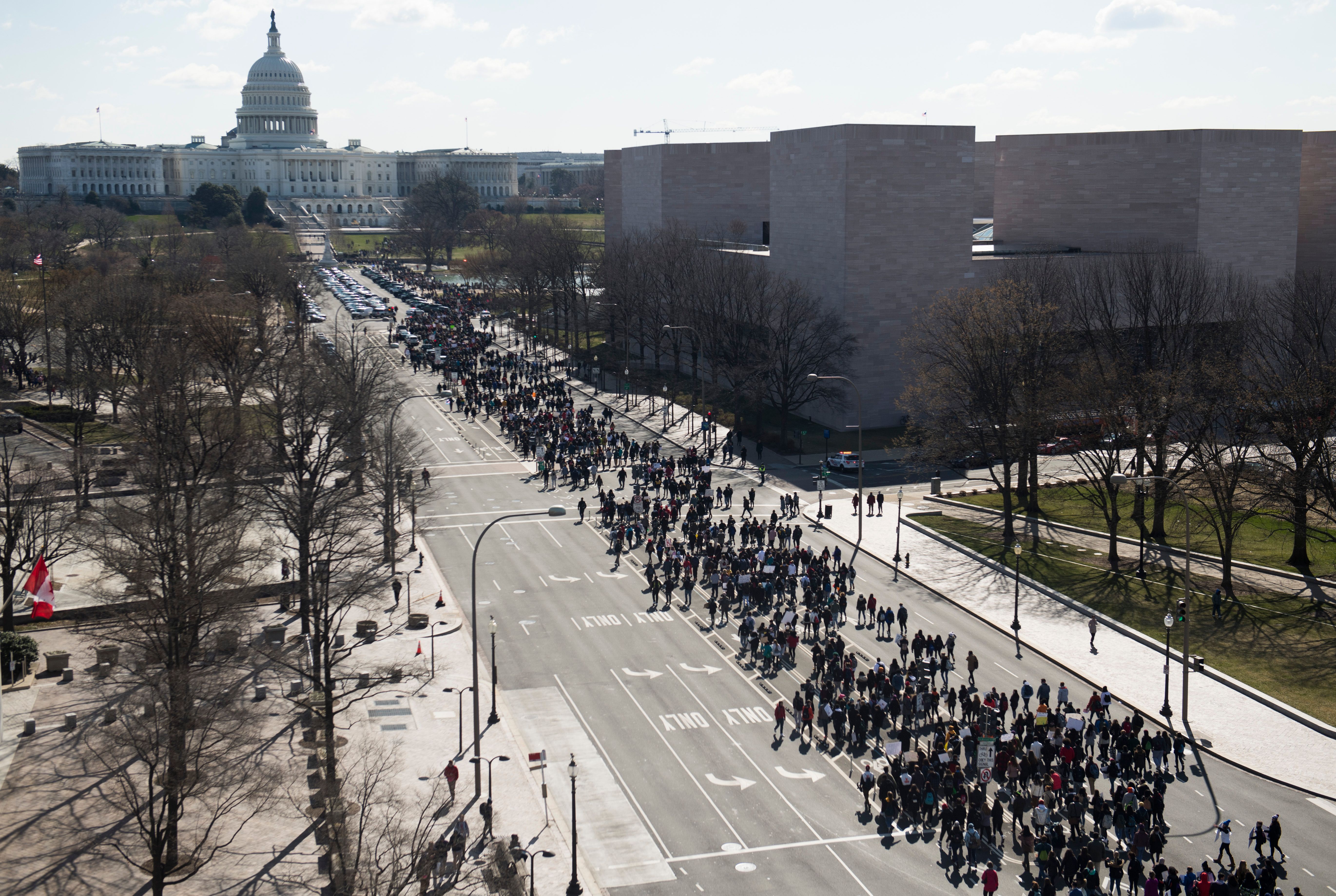 Thousands of local students march down Pennsylvania Avenue during the walkout in Washington, D.C.