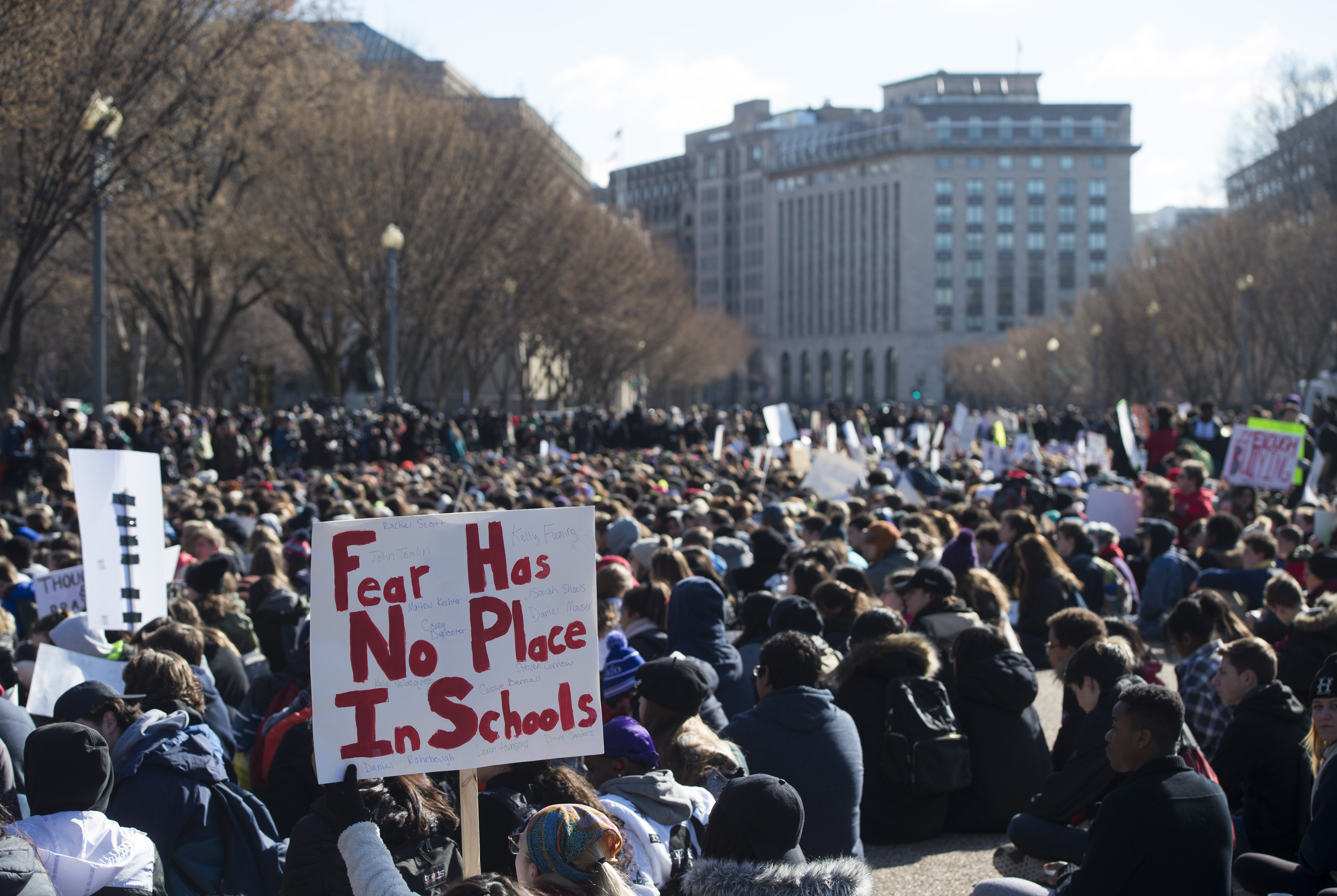 Students in Washington, D.C., sit for 17 minutes in honor of the 17 people killed in Parkland last month.