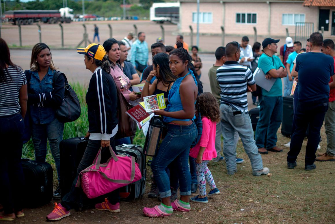 Venezuelans wait in a queue in front of the Brazil Federal Police Office in the Venezuela-Brazil border, at Pacaraima, Roraima, Brazil, on February 28th, 2018. According to local authorities, around 1,000 refugees are crossing the Brazilian border each day from Venezuela.