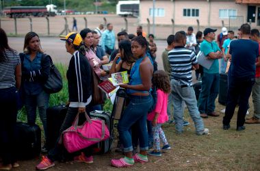 Venezuelans wait in a queue in front of the Brazil Federal Police Office in the Venezuela-Brazil border, at Pacaraima, Roraima, Brazil, on February 28th, 2018. According to local authorities, around 1,000 refugees are crossing the Brazilian border each day from Venezuela.