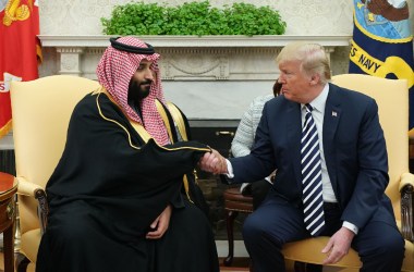 President Donald Trump shakes hands with Saudi Arabia's Crown Prince Mohammed bin Salman.