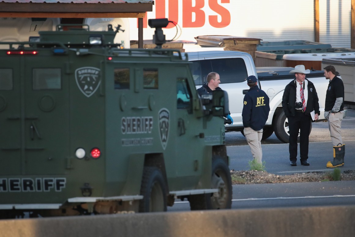 Law enforcement officials search for evidence after Mark Anthony Conditt, the suspected package bomber, blew himself up inside his vehicle as police approached to take him into custody in Round Rock, Texas, on March 21st, 2018.