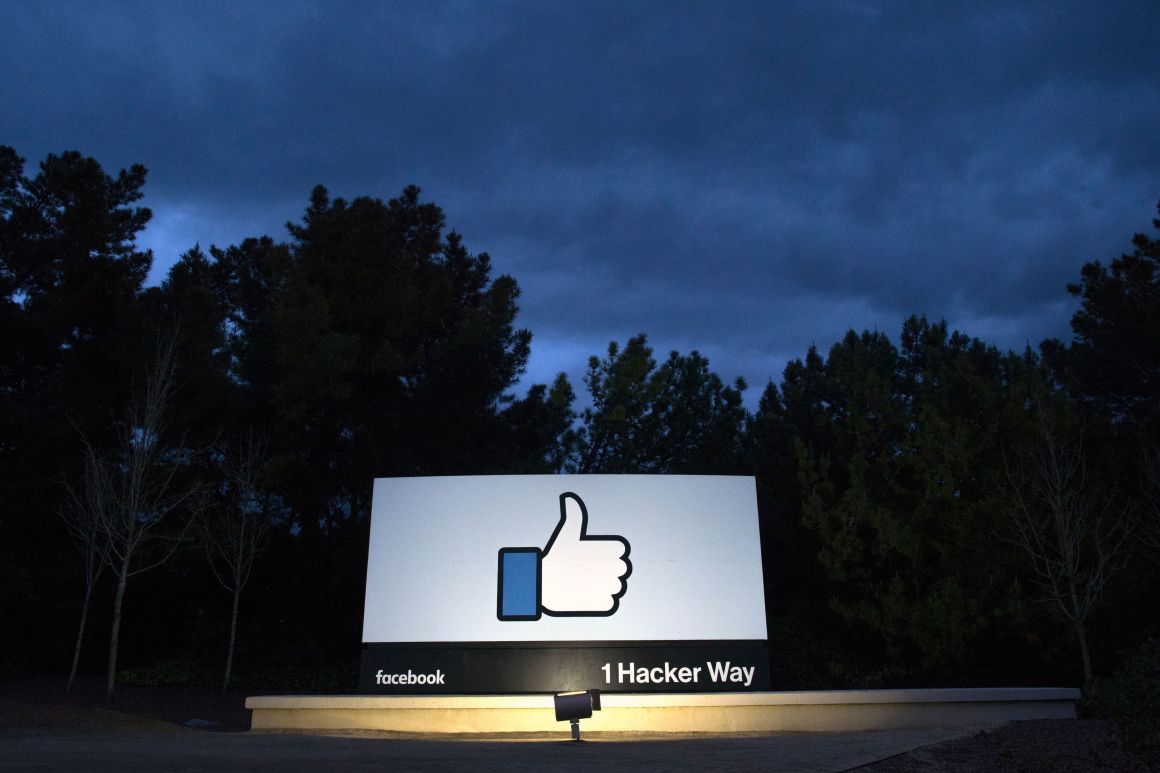 A lit sign at the entrance to Facebook's corporate headquarters in Menlo Park, California.