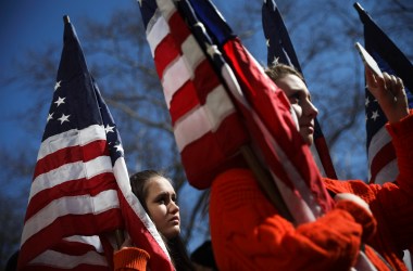 High school students from New Jersey hold American flags as they attend the March For Our Lives rally just north of Columbus Circle in New York City. Thousands of demonstrators, including students, teachers, and parents are gathering in Washington, New York City, and other cities across the country for an anti-gun violence rally organized by survivors of the Marjory Stoneman Douglas High School school shooting.