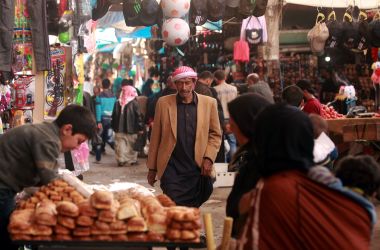 A man walks in the open air market in Manbij, northern Syria, on March 28th, 2018.