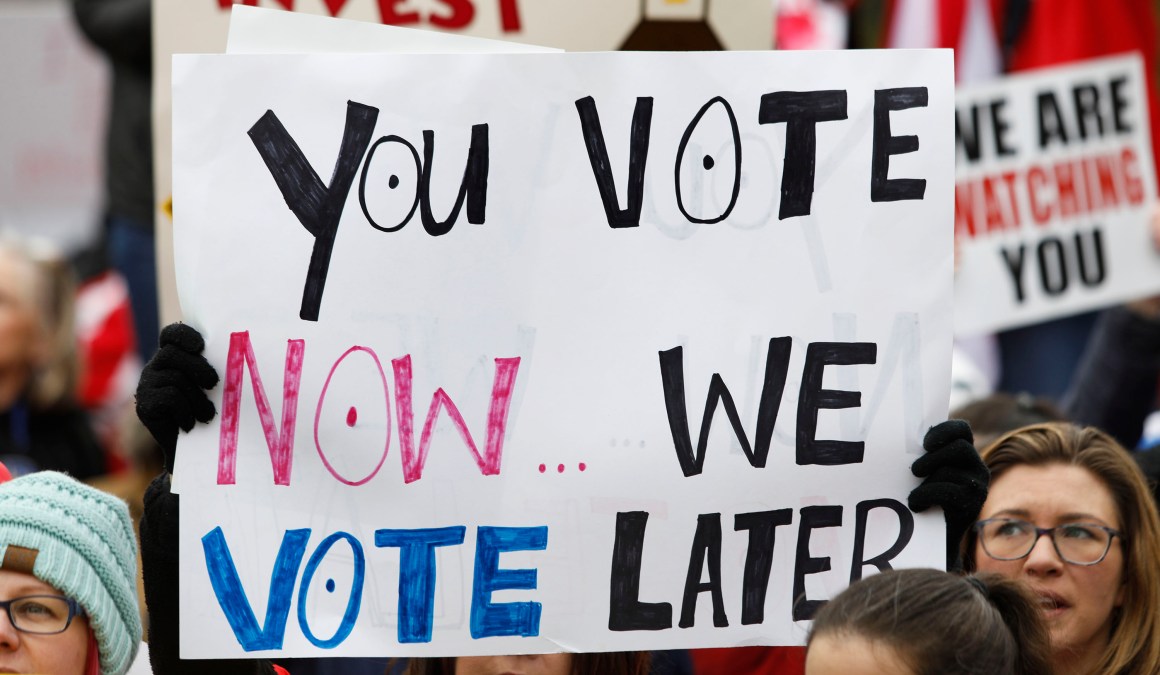 Public school teachers and their supporters protest against a pension reform bill at the Kentucky State Capitol on April 2nd, 2018, in Frankfort, Kentucky. The teachers are calling for higher wages and are demanding that Kentucky Governor Matt Bevin veto a bill that overhauls their pension plan.