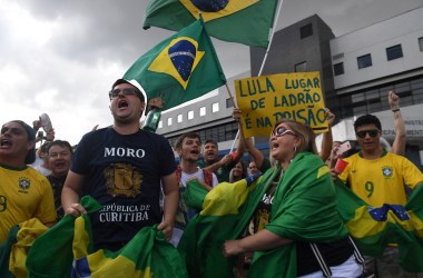 People demonstrate against former Brazilian president Luiz Inacio Lula da Silva outside the Federal Police headquarters.