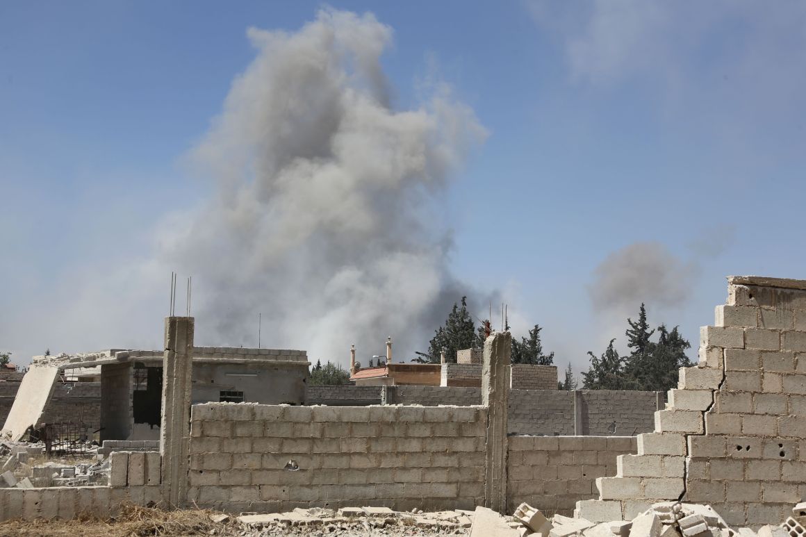 Smoke billows in the town of Douma on April 7th, 2018, after Syrian regime troops resumed a military blitz to pressure rebels to withdraw.