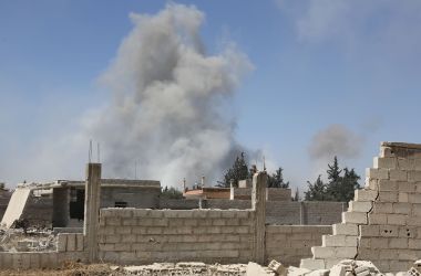 Smoke billows in the town of Douma on April 7th, 2018, after Syrian regime troops resumed a military blitz to pressure rebels to withdraw.