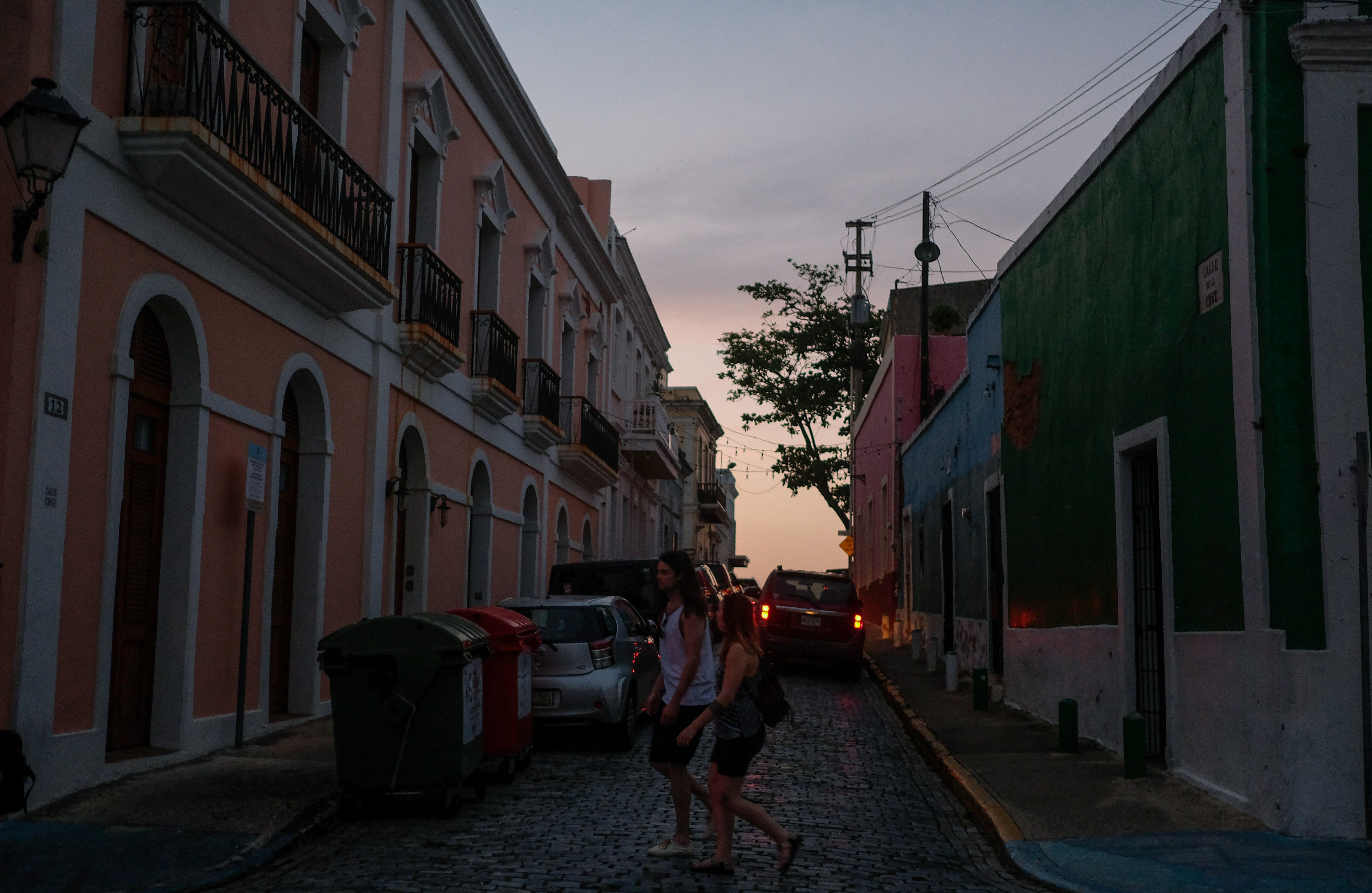 Tourists walk in Old San Juan, Puerto Rico, on April 18th, 2018.