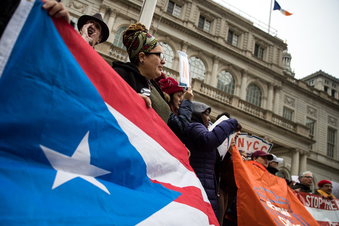 Activists rally in support of Puerto Rican families displaced by Hurricane Maria, on the steps of City Hall, April 19th, 2018 in New York City.