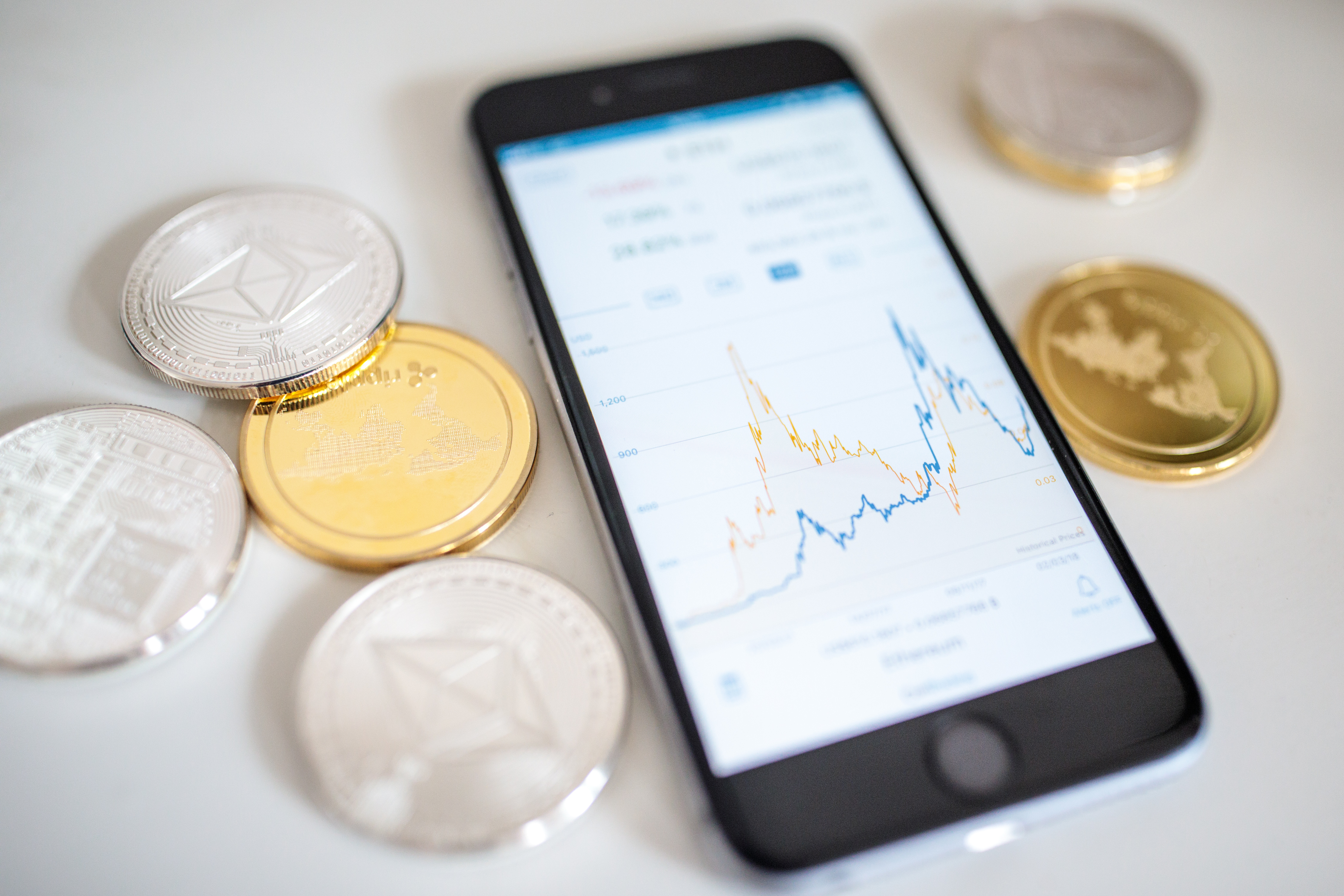 In this photo illustration of the litecoin, ripple and ethereum cryptocurrency 