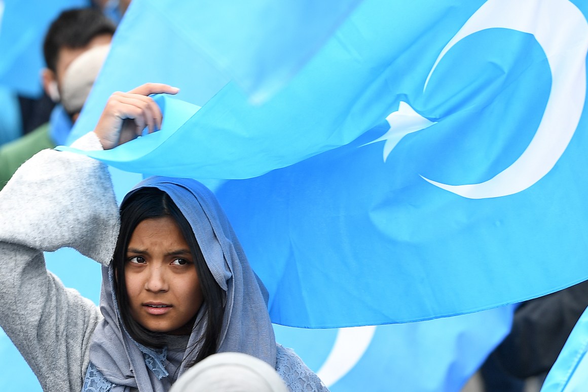 A woman takes part in a protest march of ethnic Uyghurs asking for the closure of re-education camps in China, on April 27th, 2018.