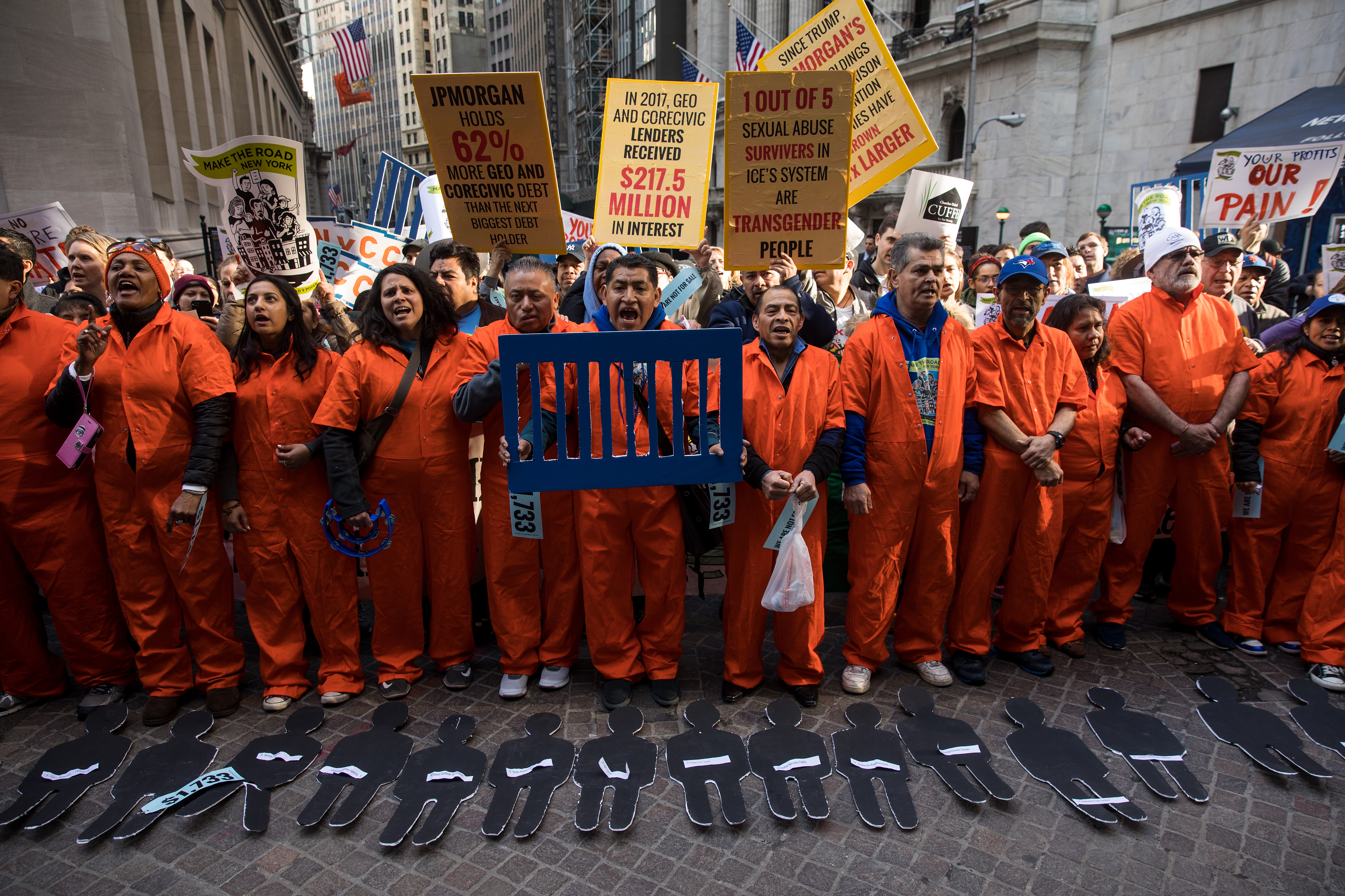 Activists rally against financial institutions' support of private prisons and immigrant detention centers, as part of a May Day protest near Wall Street on May 1st, 2018, in New York City.