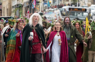 The May Day "King" and "Queen" lead the Greenmen of Glastonbury carrying this year's Maypole through the center of Glastonbury, to a ceremony at Bushy Combe below Glastonbury Tor as part of the town's Beltane May Day celebrations on May 1st, 2018, in Somerset, England. Although more synonymous with International Workers' Day, or Labor Day, May Day or Beltane is celebrated by druids and pagans as the beginning of summer and the chance to celebrate the coming of the season of warmth and light.