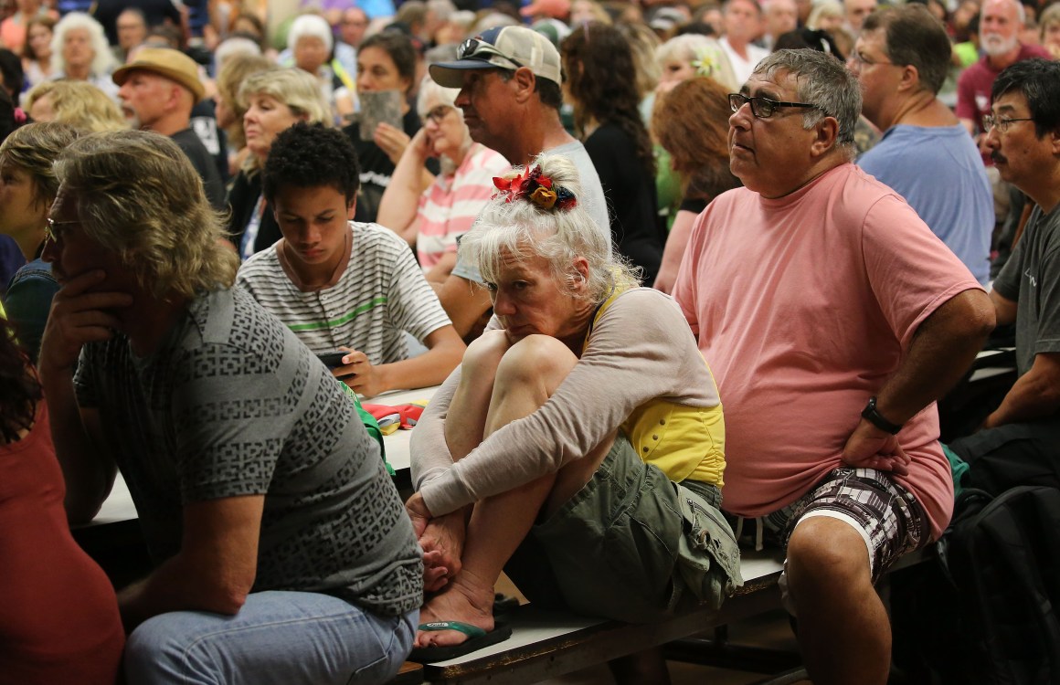 Concerned residents attend a community meeting in the aftermath of eruptions from the Kilauea volcano on Hawaii's Big Island on May 7th, 2018, in Pahoa, Hawaii.