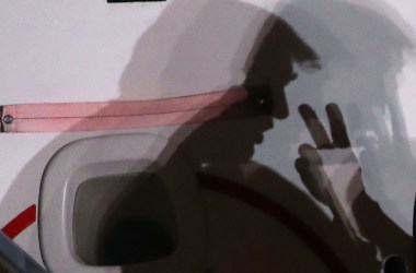 President Donald Trump casts a shadow on May 10th, 2018, at Joint Base Andrews, Maryland.