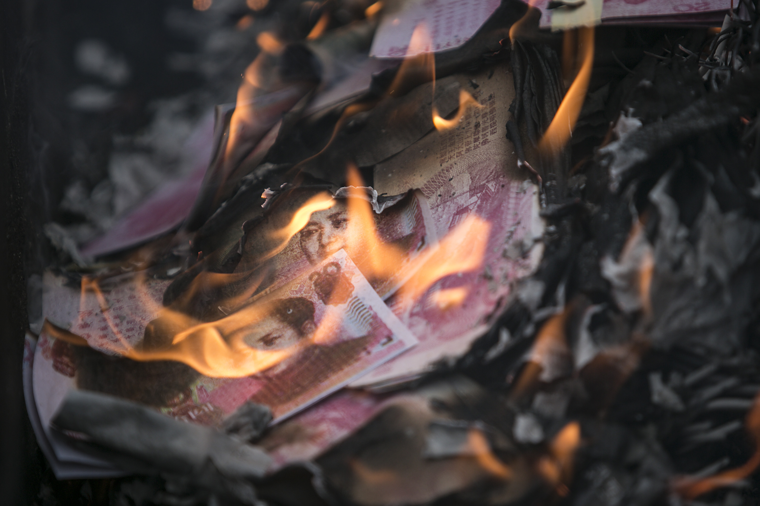 Relatives of earthquake victims burn offerings at the ruins of earthquake-hit Beichuan county during the 10-year anniversary on May 11th, 2018, in the Sichuan province of China. Beichuan county was relocated a decade after it was destroyed by the 2008 earthquake in which more than 15,000 people died.