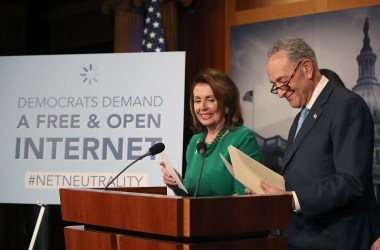 Senate Majority Leader Charles Schumer speaks at a press conference on May 16th, 2018, in Washington, D.C., as House Minority Leader Nancy Pelosi looks on.