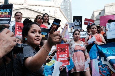 Hundreds of immigrant rights advocates and others participate in a rally at the Federal Building in lower Manhattan against the Trump administration's "zero tolerance" policy on June 1st, 2018.