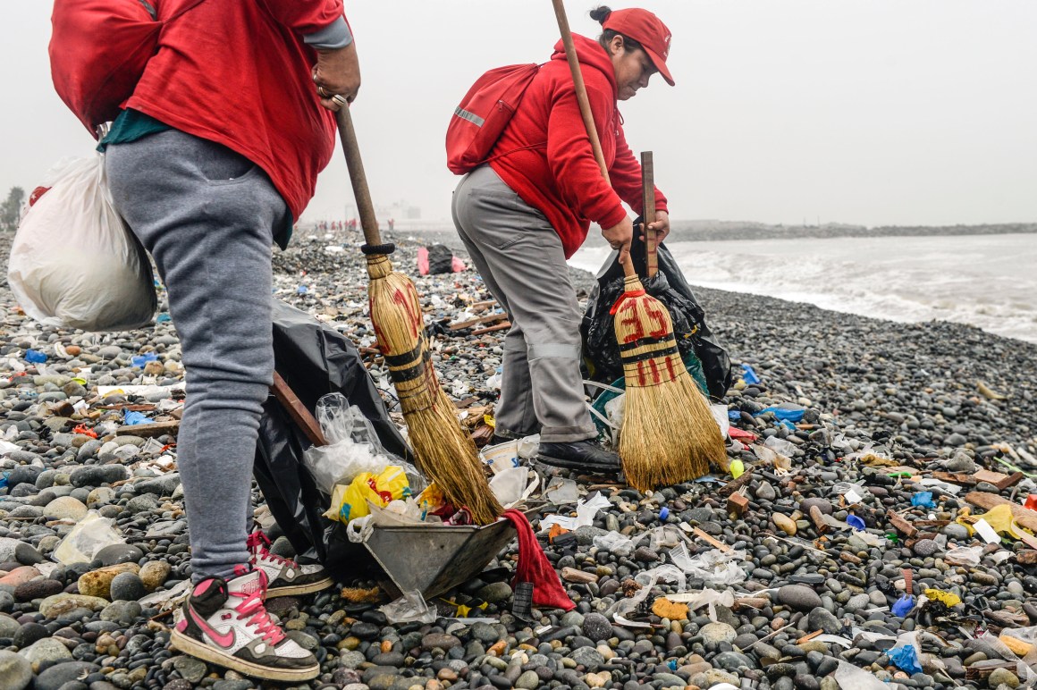 Groups of volunteers clean up plastic waste on a beach in Lima, Peru, during World Environment Day on June 5th, 2018. The United Nations urged people to take steps against the use of plastic bags, as part of a global challenge to reduce the increasing pollution of the oceans.