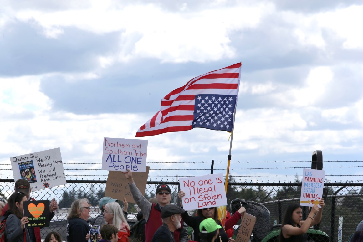 Protesters march outside a federal detention center holding migrant women on June 9th, 2018 in SeaTac, Washington.