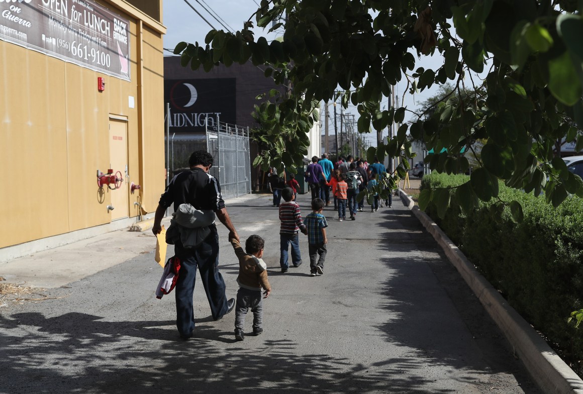 Central American immigrant families depart ICE custody pending future immigration court hearings on June 11th, 2018, in McAllen, Texas.