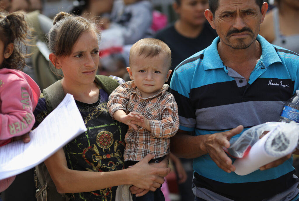 Central American immigrant families depart ICE custody in McAllen, Texas, pending future immigration court hearings, in June of 2018.