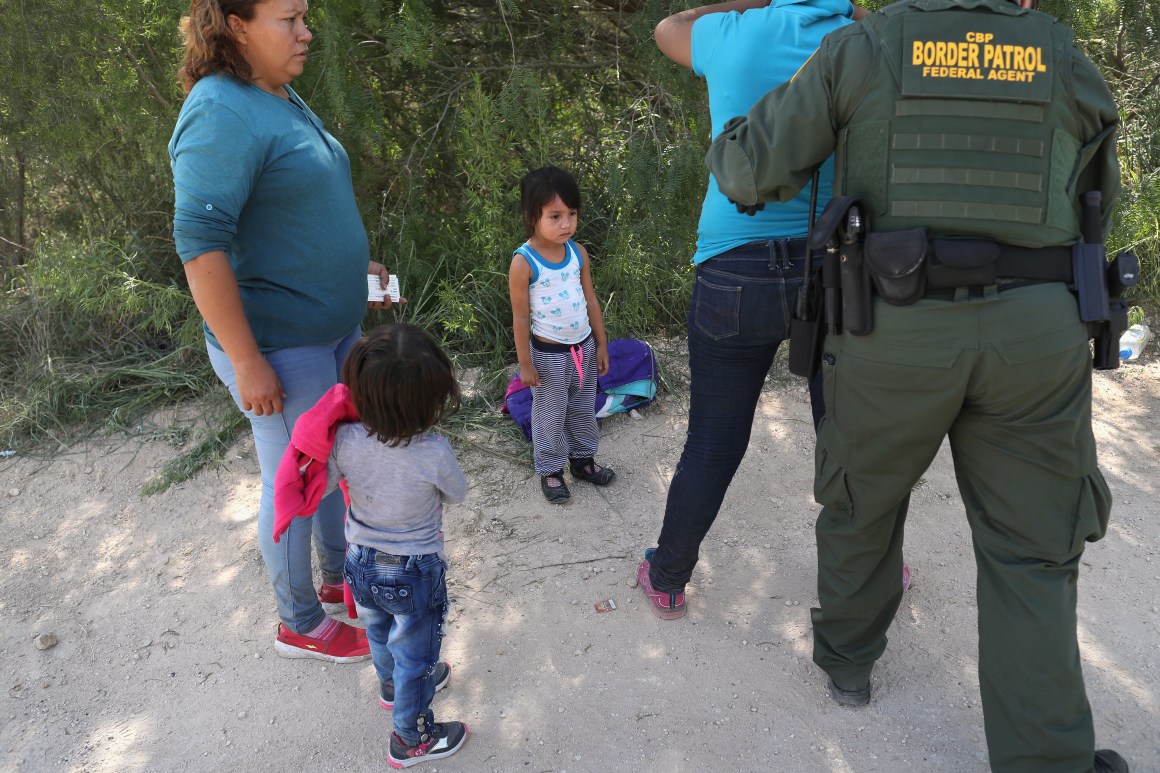 U.S. Border Patrol agents take Central American asylum seekers into custody on June 12th, 2018, near McAllen, Texas.