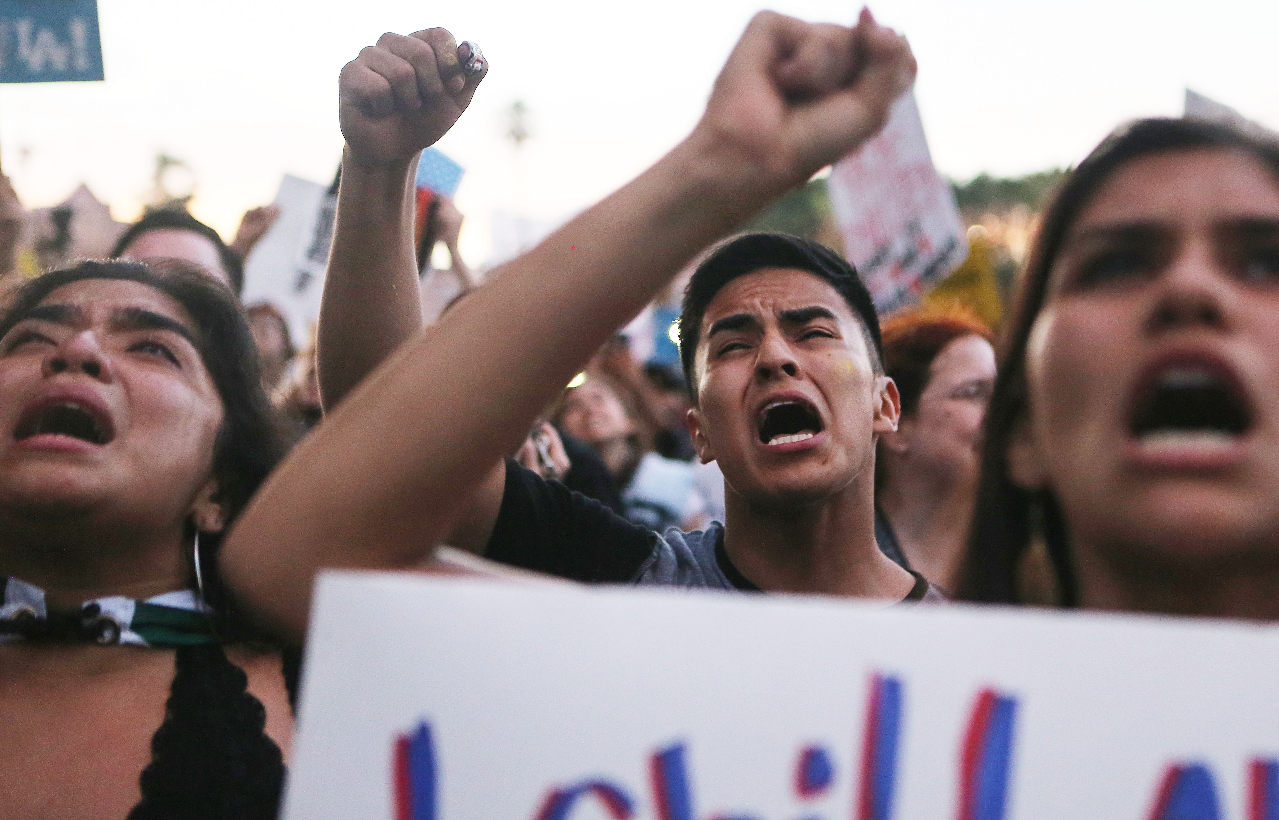 Protesters chant at the 