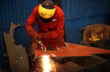 A worker at a shipyard.