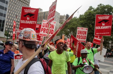 Union activists and supporters rally against the Supreme Court's ruling in the Janus v. AFSCME case.