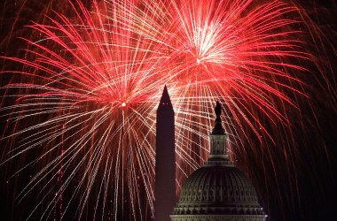 The U.S. Capitol and the Washington Monument are seen as fireworks explode above the nation's capital on July 4th, 2018, in Washington, D.C.