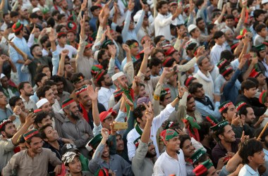 Supporters of Pakistani cricketer-turned-politician and head of the Pakistan Tehreek-i-Insaf (PTI) Imran Khan attend an election campaign rally in Charsadda district, in the Khyber Pakhtunkhwa province, on July 5th, 2018. Pakistan will hold a general election on July 25th, 2018.