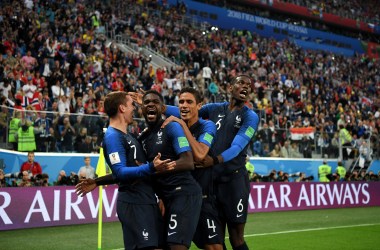 Samuel Umtiti of France celebrates with teammates after scoring his team's first goal during the 2018 FIFA World Cup Russia semi-final match between Belgium and France.